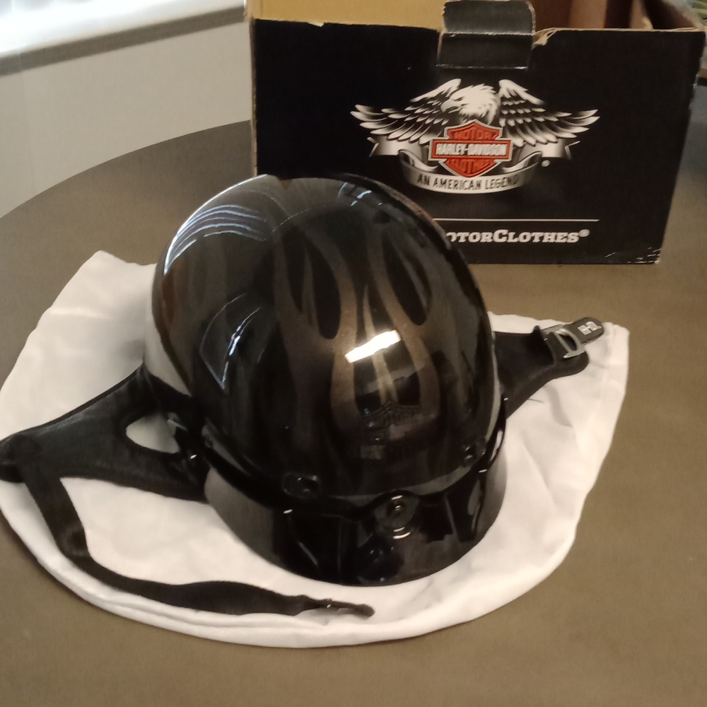 Harley-Davidson motorcycle helmet with flames.
